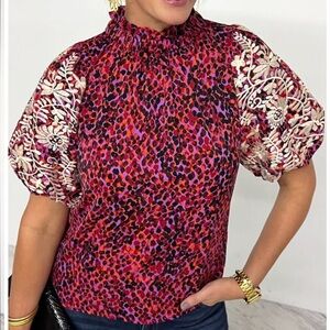 Stunning blouse! Size SMALL. New w Tag. Perfect for fall. Original Price $76